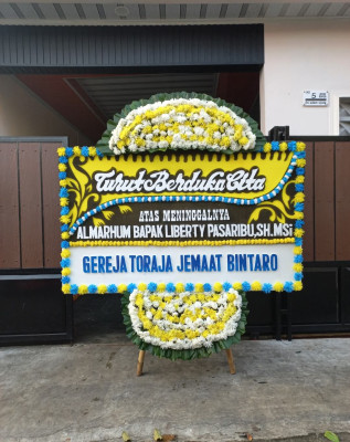 Papan Bunga Duka di Lawanggintung